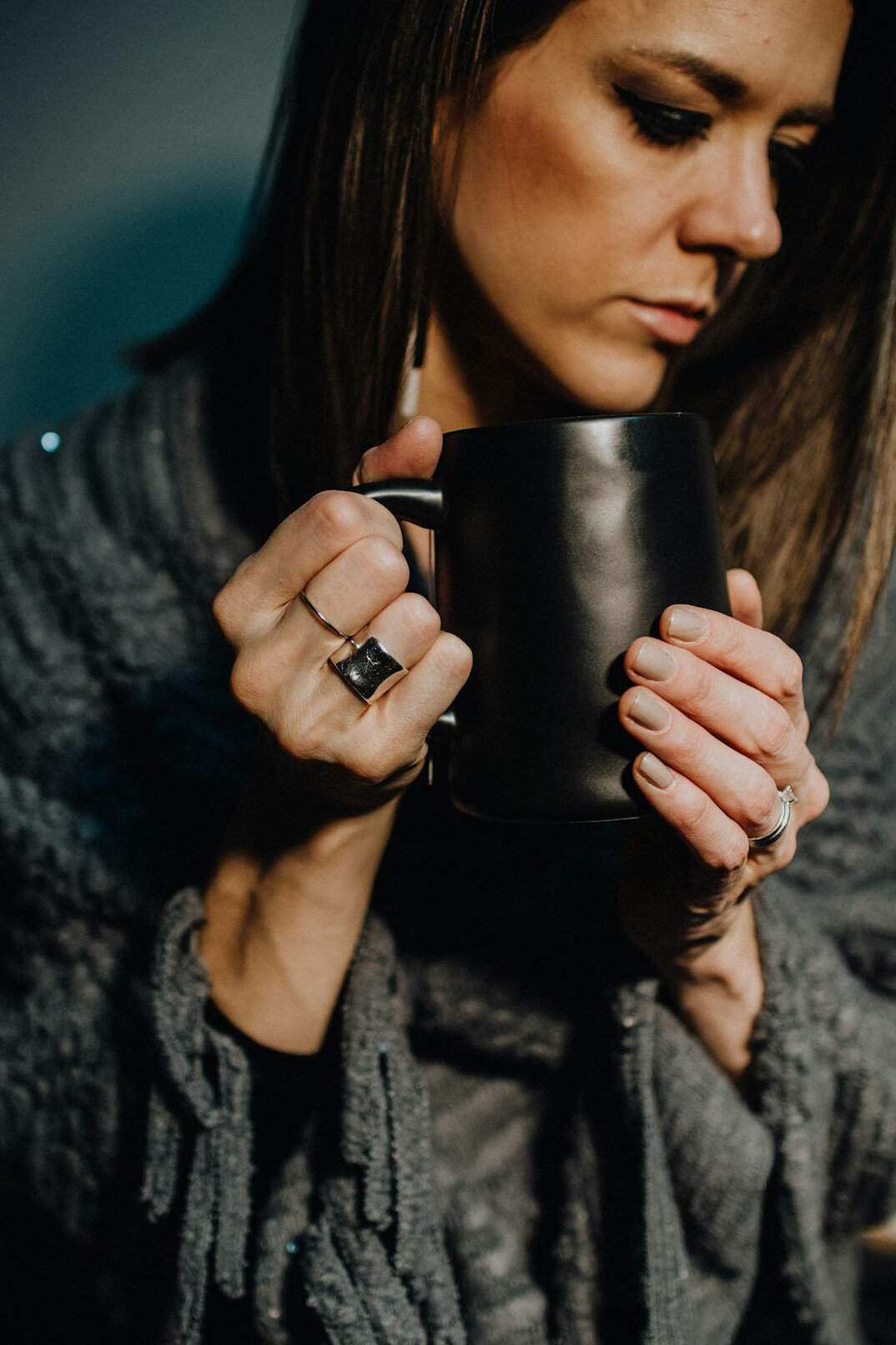 hands holding tea cup