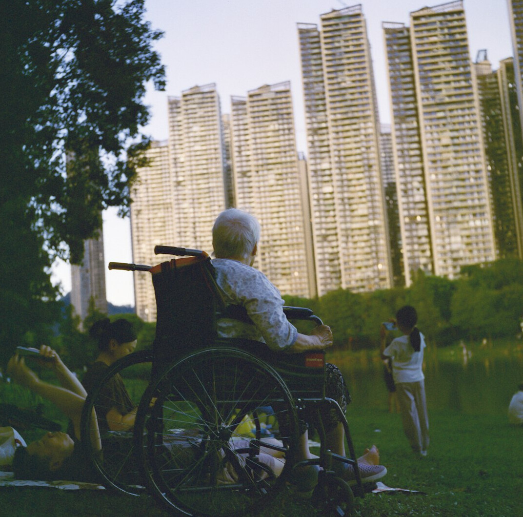 elderly person on bench