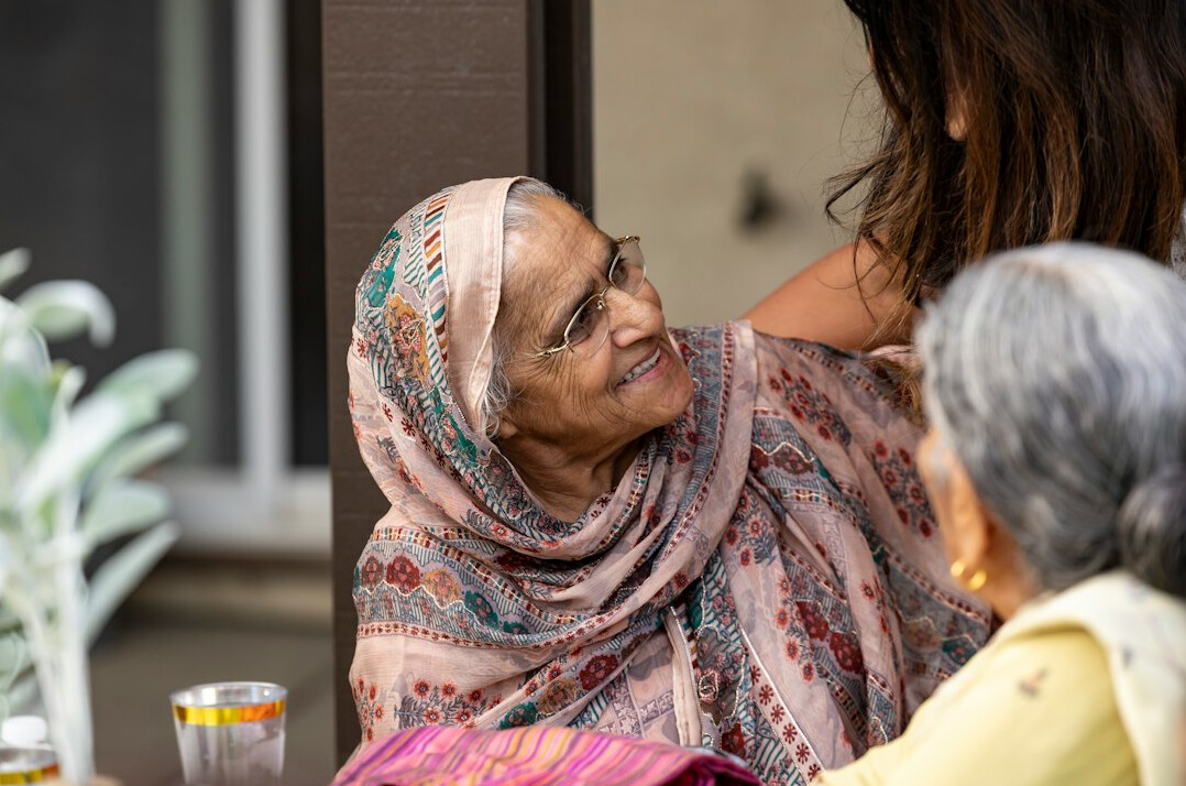 elderly woman sharing story