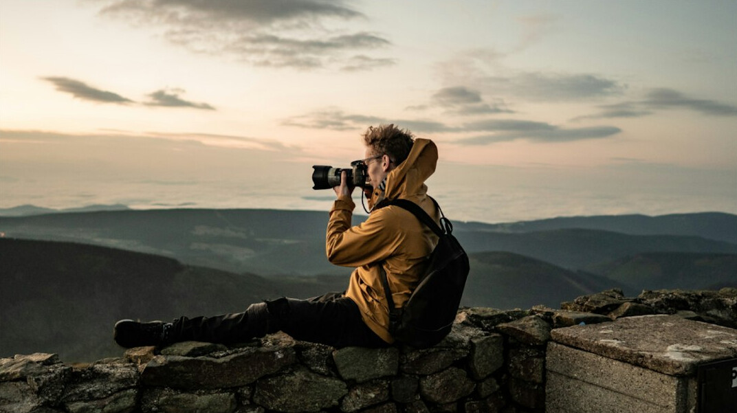 documentary photographer with camera